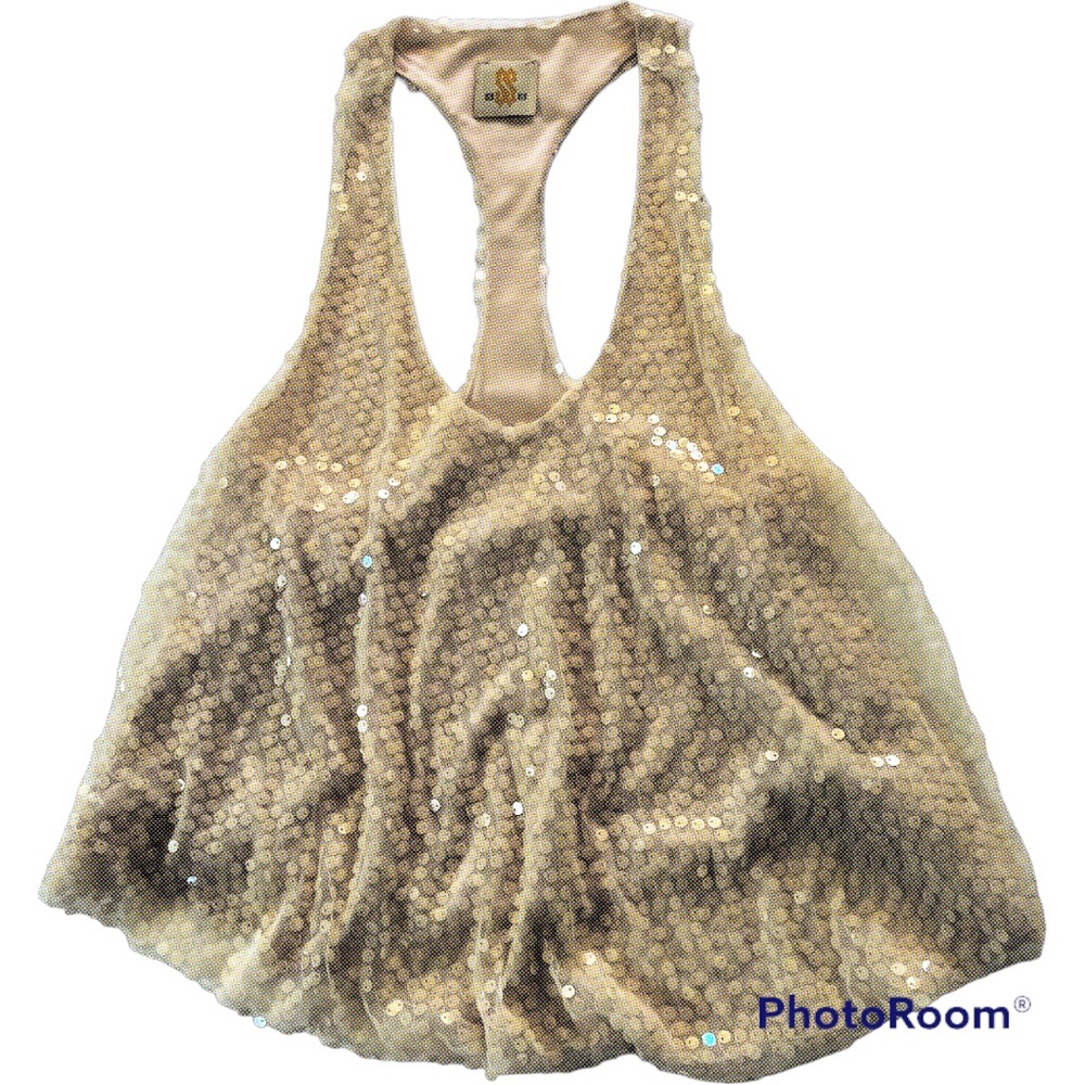 Sparkle in this cute cream sequined top